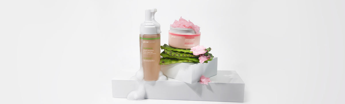 double cleanse set, glowoasis cloudcleanse with foam texture, makeupmelt cleansing balm with pink sorbet-like texture on top of prickly pear cactus pads