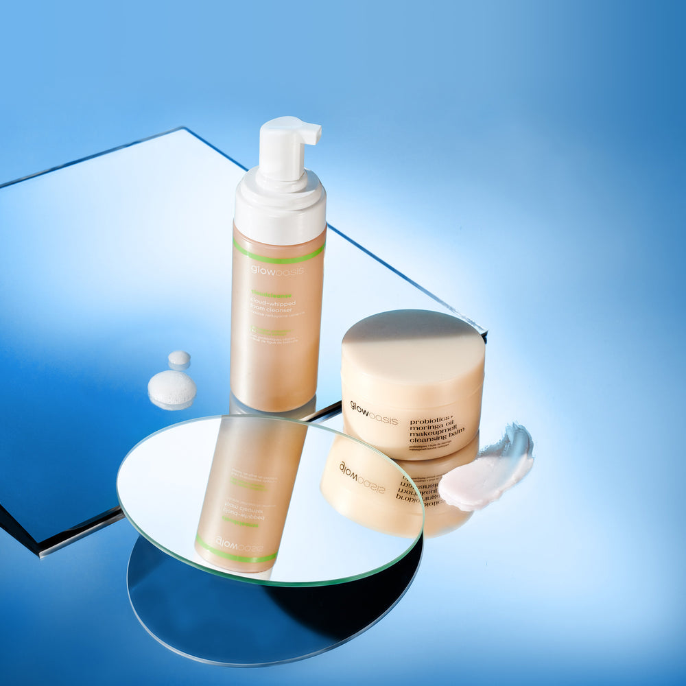glowoasis vegan skincare kit for double cleanse routine reflecting off mirrors, featuring makeupmelt probiotics cleanser and cloudcleanse probiotics face wash.