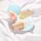 Travel-size vegan skincare set featuring mini makeupmelt cleansing balm, cloudcleanse probiotics face wash, and 3 powder-to-foam enzyme exfoliator packets.