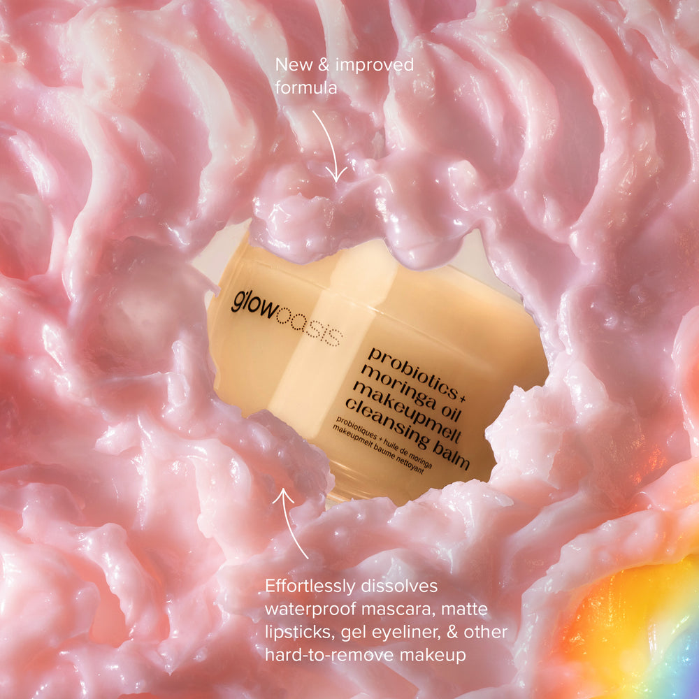 glowoasis vegan probiotic moringa oil makeupmelt cleanser for makeup removal, surrounded by its cream to oil cleansing balm texture.