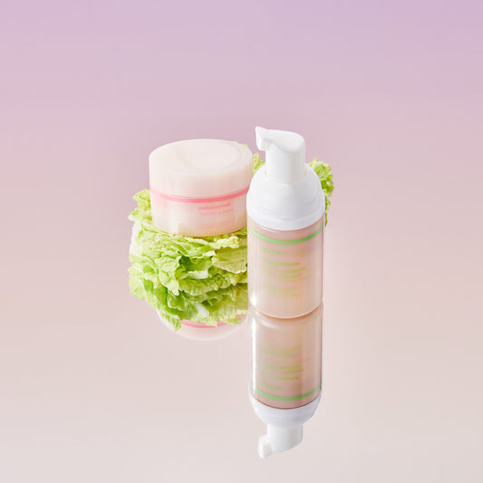 Mini cloudcleanse facial cleanser and mini makeup melt on a mirrored background.