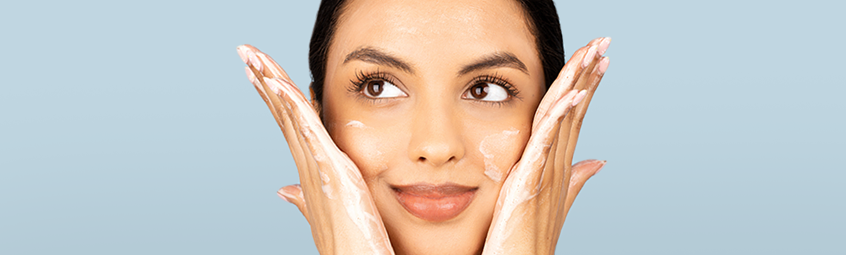 a woman showcasing how to use cloudcleanse cloud-whipped foam cleanser 