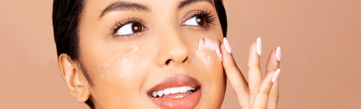 a woman showcasing skincare with clean ingredients 