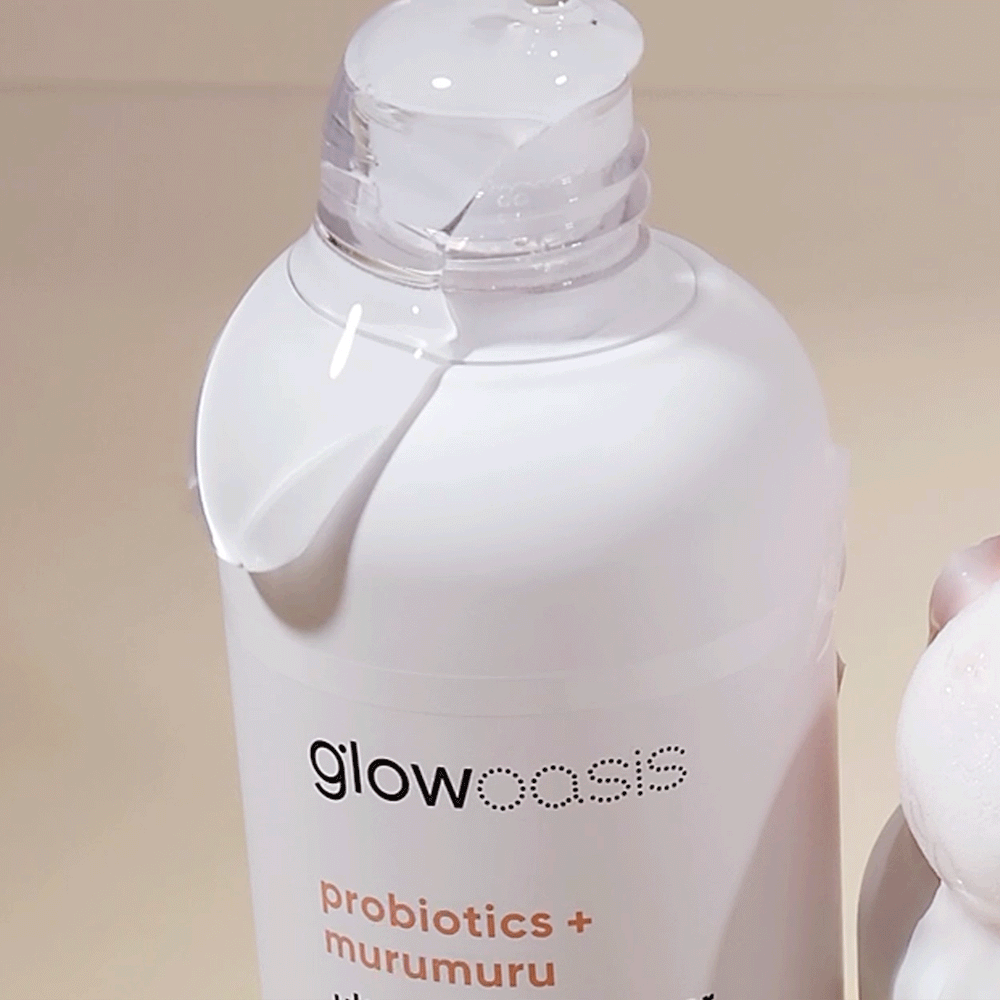 Formula poured over glowoasis vegan probiotics ultra calming toner.